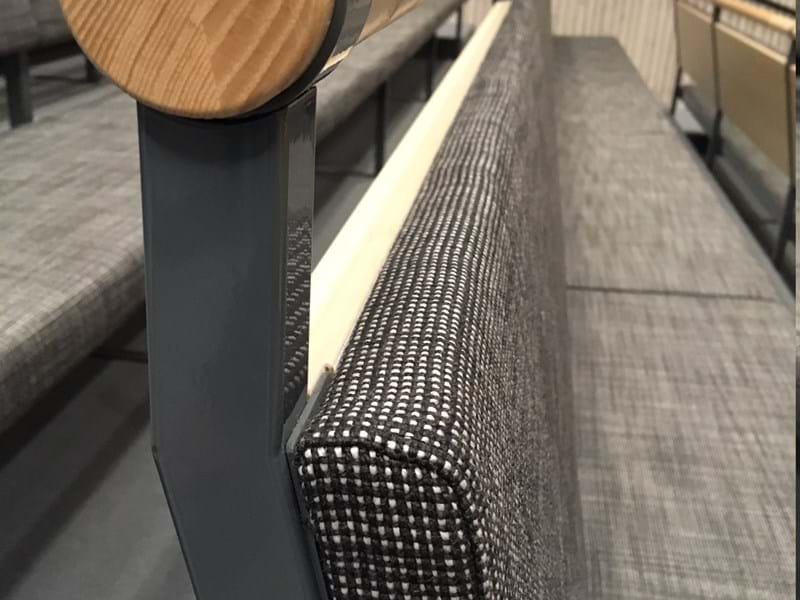 Kyrkbänkar klädda i Svenssontyget Rami plus i Korskyrkan i Umeå Sweden