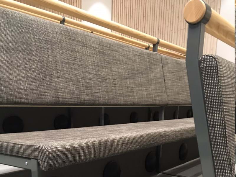 Kyrkbänkar klädda i Svenssontyget Rami plus i Korskyrkan i Umeå Sweden